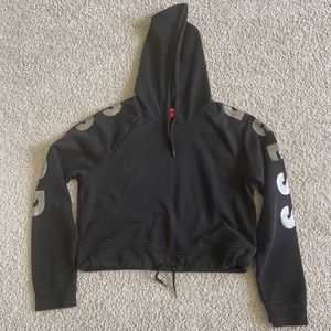 Guess Women’s Hooded Crop Black Sweatshirt. Drawstring waist. Size large.